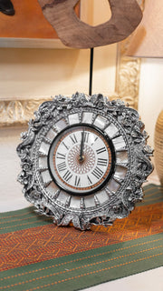Rasava Jewels 999 Pure Silver wall clock with mother of pearl accents, showcasing a sleek, elegant design and detailed craftsmanship.